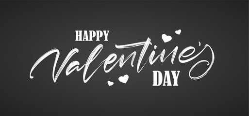 Hand drawn brush lettering of Happy Valentines Day with hearts on chalkboard background.