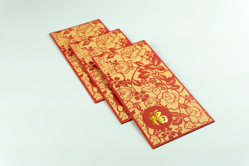 Fototapeta na wymiar Red packet Chinese New Year Angpao isolated on white background. Chinese wording is 