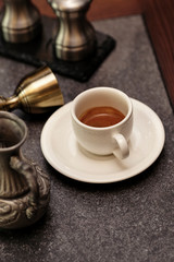 cup of coffee and cookies on wooden table