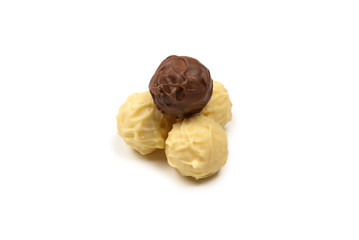 Chocolate truffle isolated on white background.
