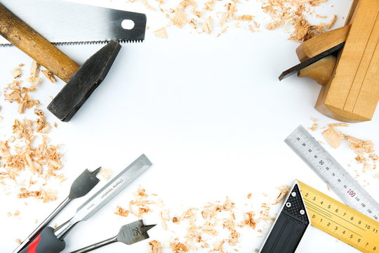 Carpentry Tools With Wood Shavings On A White Background Flat Lay