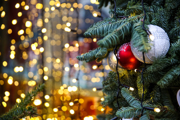 Christmas background with Christmas tree, balls and lights