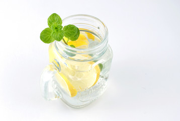 Glass of water, lemon and mint. Detox.