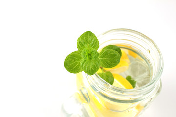 Glass of water, lemon and mint. Detox