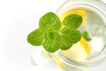 Glass of water, lemon and mint. Detox