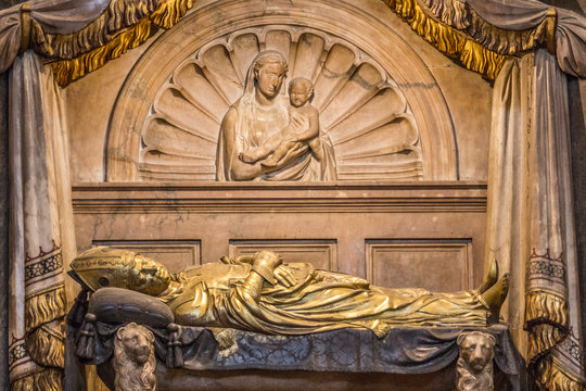 statue of prist in tomb