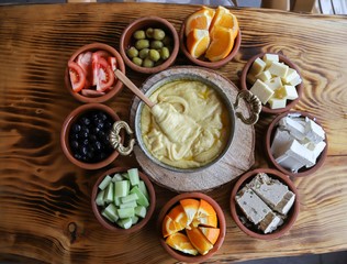 Traditional Turkish breakfast table .There are quite a lot of food on the table.