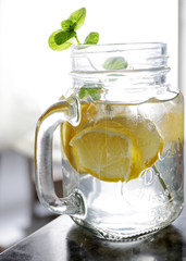 Glass of water, lemon and mint. Detox.