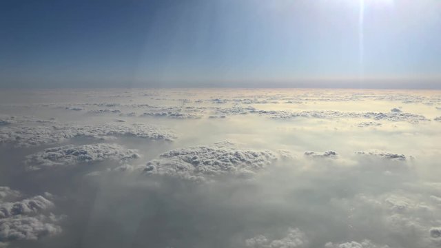 View from the window of an aeroplane flying in the clouds.