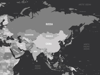 Asia - grey colored on dark background. High detailed political map of asian continent with country, capital, ocean and sea names labeling