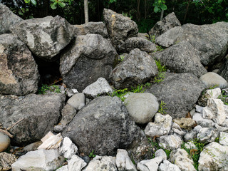 Texture of Big Stones laying on ground in the park