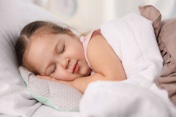 Fototapeta na wymiar Cute little girl sleeping at home. Bedtime schedule