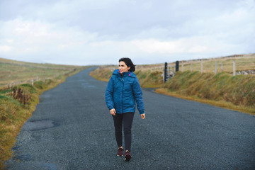 walking woman on road