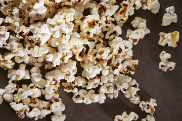 Popcorn on black background, close up 