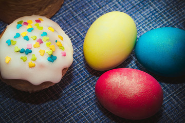 Easter composition on a dark blue background.