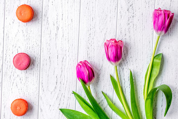 flowers spring tulips top view on wooden background mockup