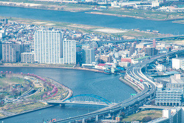 Naklejka na ściany i meble TOKYO, JAPAN - March 27 2019: Tokyo skyline along sumida river Japan Panorama