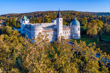 Renaissance castle and park in Krasiczyn near Przemysl , Poland. Aerial view in fall in sunset light - obrazy, fototapety, plakaty