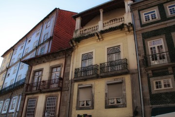 Fototapeta na wymiar Old colorful tiled facades in Porto city