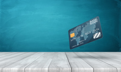 3d rendering of dark blue plastic bank card on white wooden floor and dark turquoise background