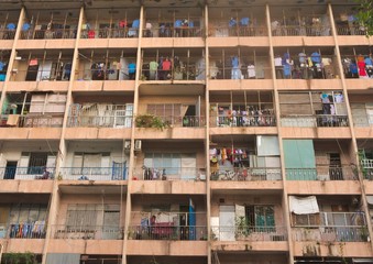 Balconies on a decaying and overcrowded apartment building in Saigon, Vietnam (Ho Chi Minh City)