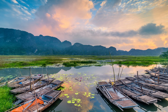 Landscape with boat in Van Long natural reserve in Ninh Binh, Vietnam
