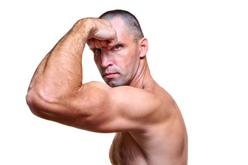 Mature handsome man with a naked torso isolated on a white background