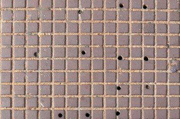 Cast-iron gutter with holes