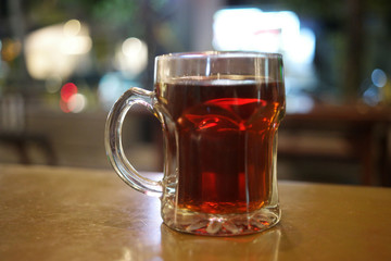 A glass of tea on the table