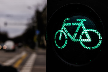 Traffic light for cyclists. Green light for bycicle lane on a traffic light.