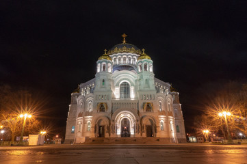 Fototapeta na wymiar The St. Nicholas Wonderworker's Naval Cathedral in the night illumination close-up. Kronstadt, Russia