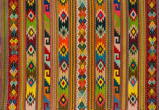 Colourful woven Mexican wool rugs