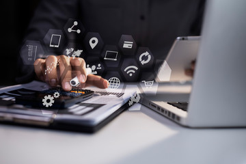 Hands of business people working with documents on office table. Double exposure Concept.