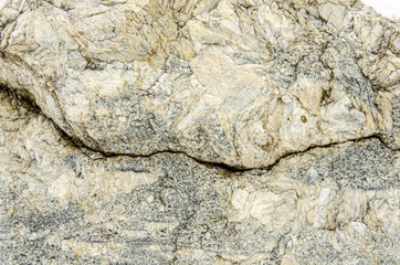 Granite structure near. Stone surface .
