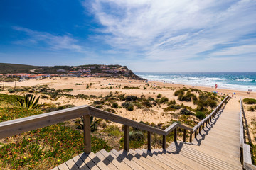 View of the Monte Clerigo beach on the western coastline of Portugal, Algarve. Stairs to beach Praia Monte Clerigo near Aljezur, Costa Vicentina, Portugal, Europe.