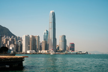 Central pier, victoria harbour and skyline of HongKong Island -