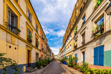 Cremieux Street (Rue Cremieux), Paris, France. Rue Cremieux in the 12th Arrondissement is one of the prettiest residential streets in Paris. Colored houses in Rue Cremieux street in Paris. France.