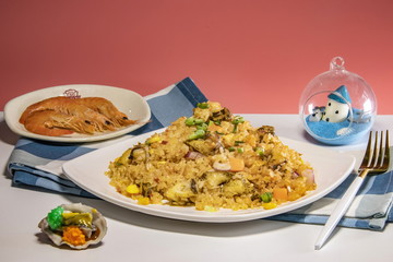 There are fried rice in Asia. They put scallops, squid and shrimps together to cook delicious food