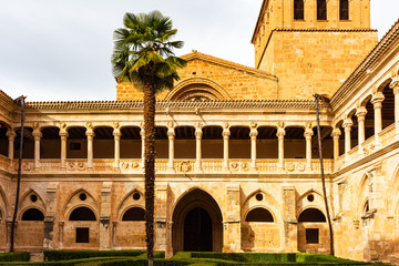Obraz premium View of the inner courtyard of the Gothic cloister of the Cistercian monastery, Sta Maria of Huerta, Aragon, Spain