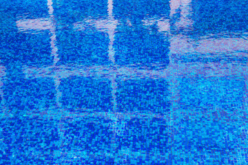 Fototapeta na wymiar Abstract background of blue water surface in swimming pool.