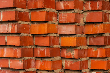 Brickwork of gray and red bricks.