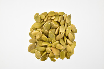pumpkin seeds isolated on white background, top view