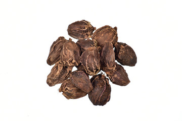 stack of black cardamom isolated on white background with clipping path, top view 