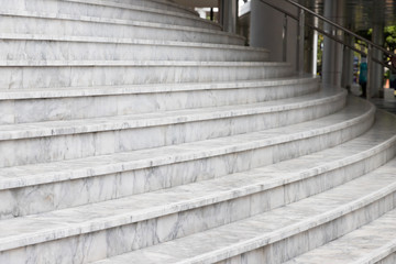 curve marble stair. outdoor white stone steps with stainless steel handrail.