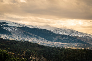 Fototapeta premium The mountains of Lebanon were once shaded by thick cedar forests and tree is the symbol of country. Beautiful landscape of mountainous town in winter, Eco tourism, Chouf district with large vistas