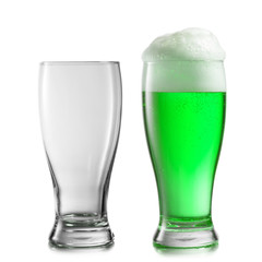 Empty and full glasses of green beer on a white background.