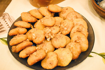 Traditional Greek holiday cuisine – tasty sweet homemade pastry with nuts (selective focus)