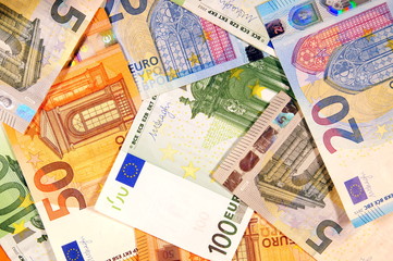 pile of paper euro banknotes as part of the european payment system. Euro money banknote, business and finance concept
