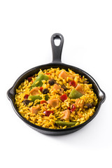 Fried rice with chicken and vegetables on frying iron pan isolated on white background