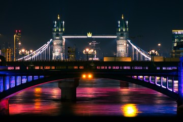 Tower Bridge in night time magic light on river